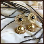 Jhumkas in .925 Sterling Silver with Black Onyx and Gold plating. 55mm length